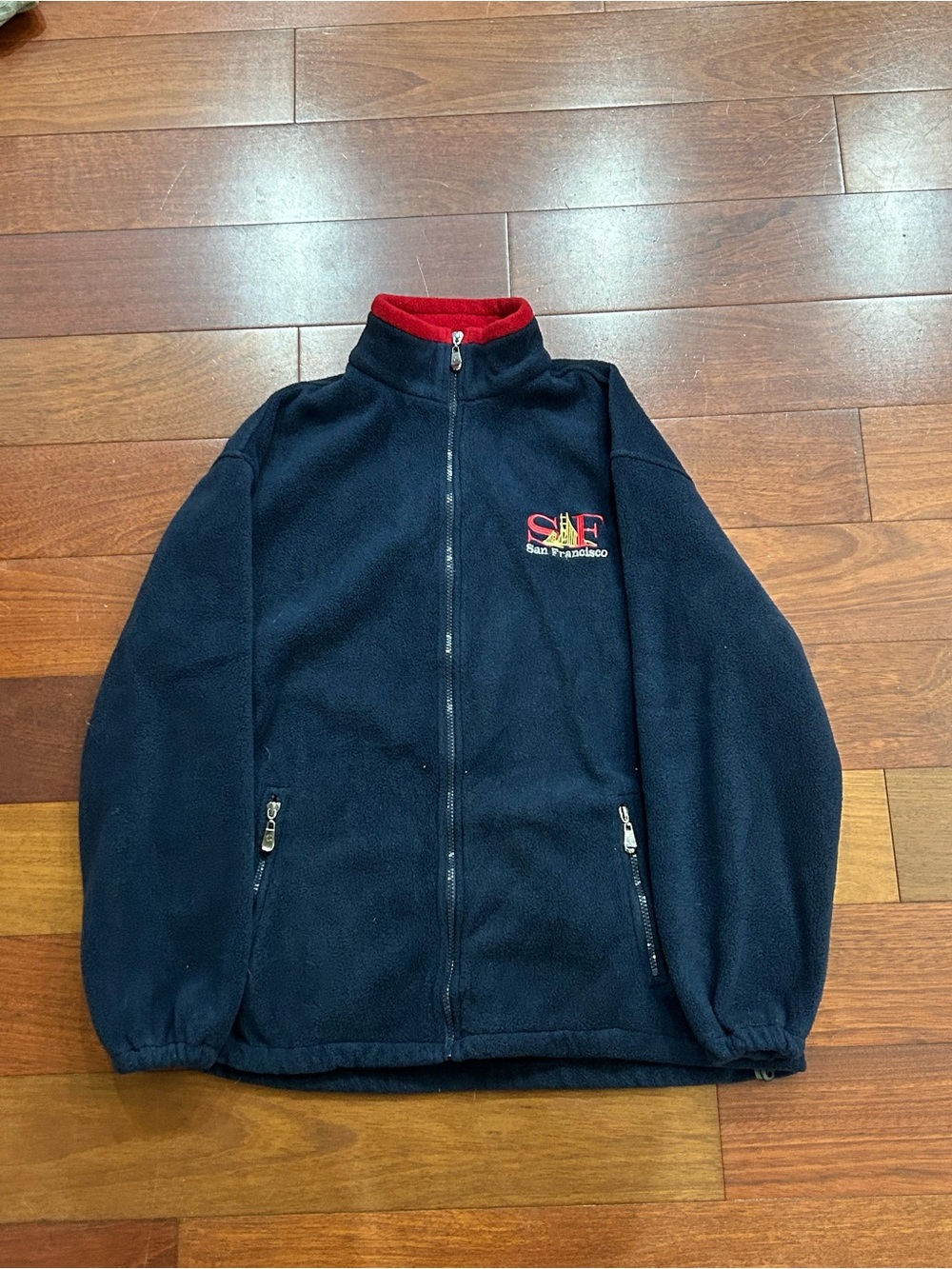 Men’s Navy Fleece Jacket with Red Trim and SF Embroidery